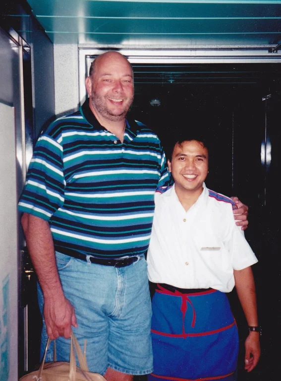 Saying Goodbye to our Room Steward Santiago